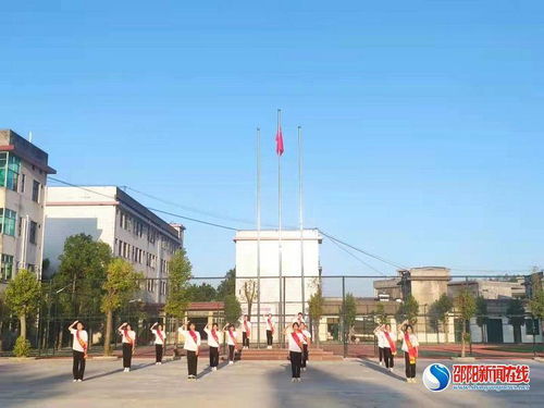 兩校共燃愛國情 洞口縣石江鎮中學與潮安縣彩塘中學愛國主題升旗儀式紀實